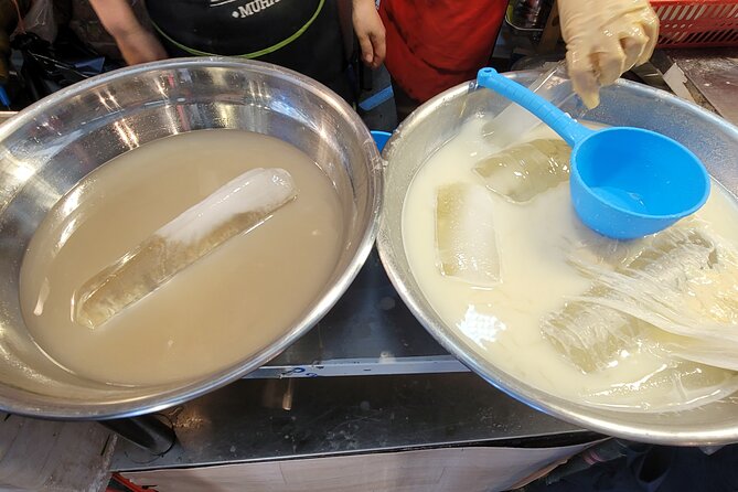 Busan Dialect Class with local snack - Bujeon Market: Where Your New Phrases Meet Street Food