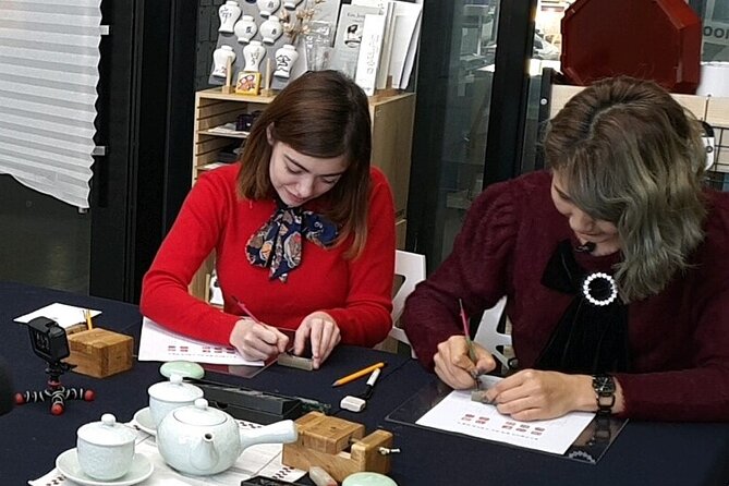 Carve Your Personal Korean Stone Seal with Jeongju in Insadong - Ink, stamping, and the satisfying first result