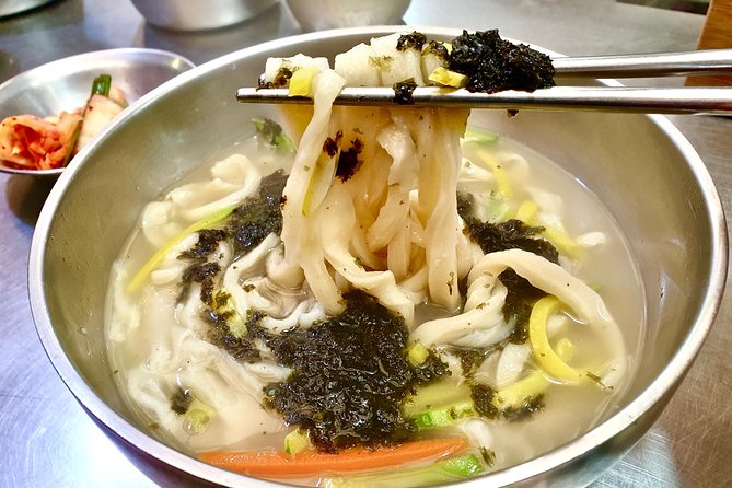 Downtown Seoul Guided Food & Market Tour with 8+ Local Tastings - Bukchon Hanok Village: old houses, new tastes