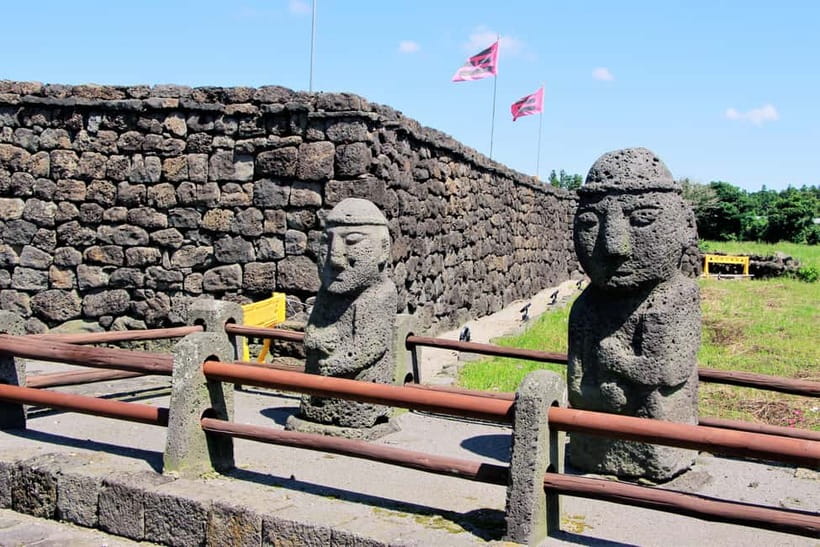 Jeju Highlights Day Trip (East Course) - Sunrise Land: Seasonal Flowers, Lava Caves, and Pond Strolls