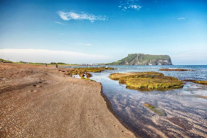 Jeju Island Private Taxi Tour : UNESCO Day Tour - Stop 5, Woljeongri Beach: calm sand and a café strip nearby