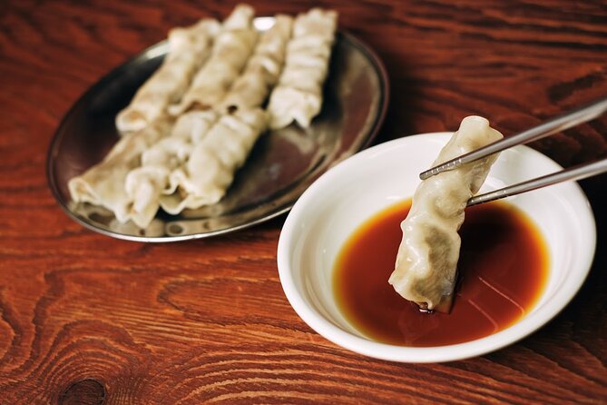Private Downtown Seoul Food & Market Tour with 8+ Tastings - Namdaemun Market by Great South Gate: where your tastings meet real life