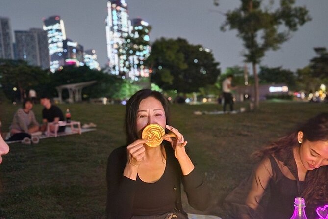 Seoul Han River Night Tour: Picnic, Games & Starlight Cruise - Stop 3 at the Cruise Dock: 50 Minutes of Bridges, Reflections, and Live Music