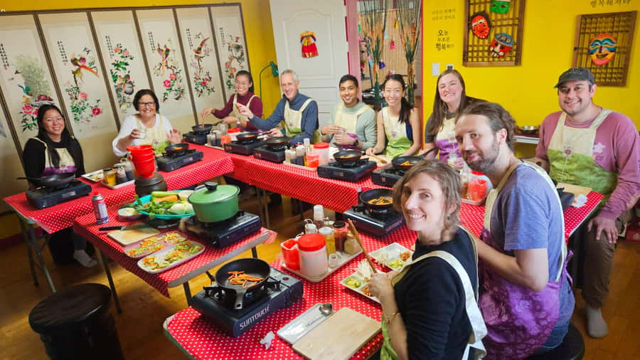 Seoul: Korean Cooking Class at a Local Home and Market Tour - Cooking Four Dishes: The Skills That Translate to Home