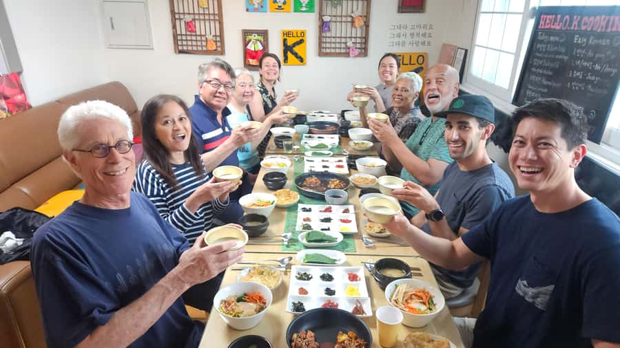 Seoul: Korean Cooking Class at a Local Home and Market Tour - Hanjeongsik Meal: 10+ Side Dishes, Seasonal Fruit, and Rice Wine