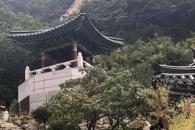 Seoul Mountain Hike: Temples, Folklore & Traditional Meal - The Temple Moments: Hidden Buddhist Stop on a Rugged Mountain Route