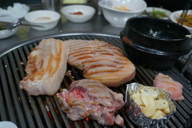 Seoul Night "Private Tour"(Korean BBQ, N-Tower, Seoul Fortress, Local Market) - Kwangjang Market After Dark: Food Culture Without the Grind