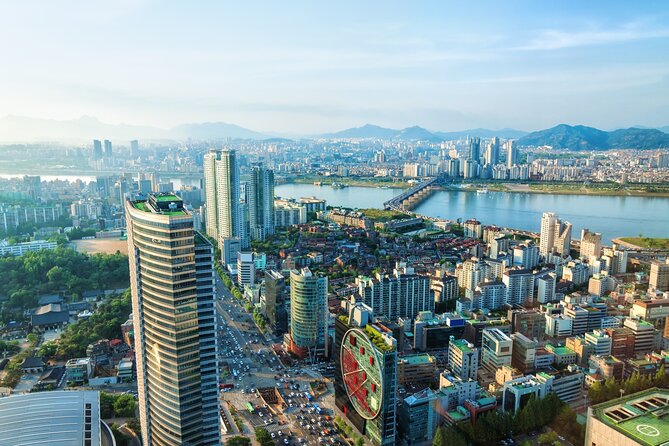 Seoul One Day Sightseeing Tour with N Tower and Lunch - Gwanghwamun and Cheonggyecheon Stream: city icons plus a real walk